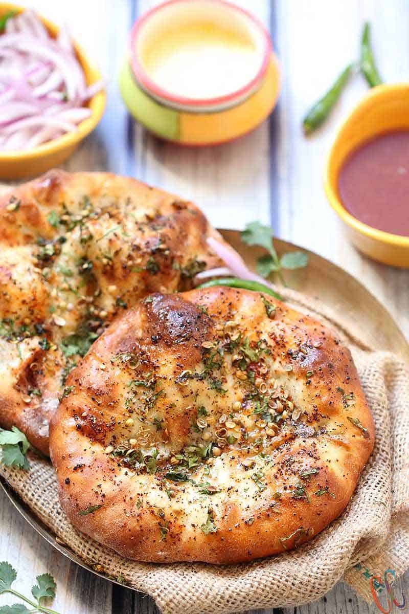 Amritsari Kulcha / Kulcha bread is crisp as well as soft leavened bread which is stuffed with boiled and mashed potatoes and spices. This bread is similar to Naan. This the best and easy Stuffed Kulcha recipe ever.