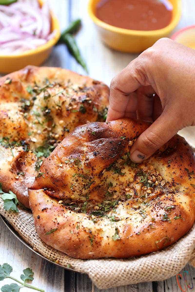 Amritsari Kulcha / Kulcha bread is crisp as well as soft leavened bread which is stuffed with boiled and mashed potatoes and spices. This bread is similar to Naan. This the best and easy Stuffed Kulcha recipe ever.