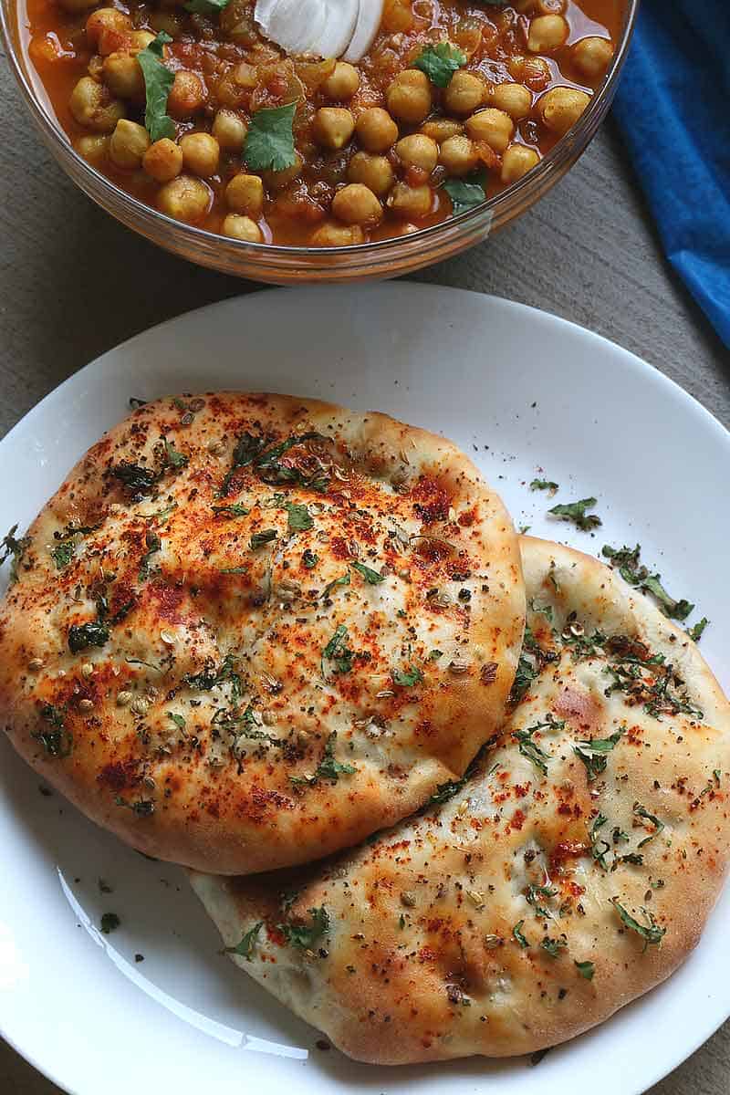 Amritsari Kulcha / Kulcha bread is crisp as well as soft leavened bread which is stuffed with boiled and mashed potatoes and spices. This bread is similar to Naan. This the best and easy Stuffed Kulcha recipe ever.