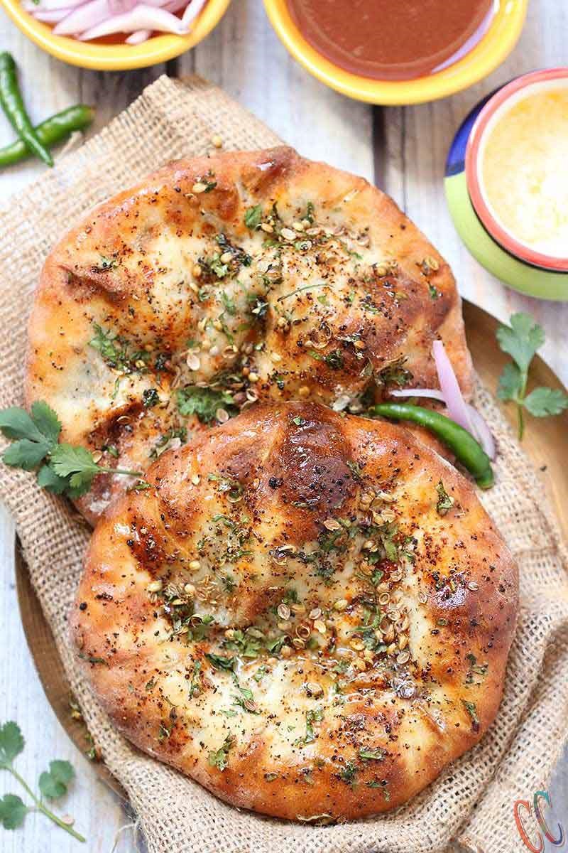 Amritsari Kulcha / Kulcha bread is crisp as well as soft leavened bread which is stuffed with boiled and mashed potatoes and spices. This bread is similar to Naan. This the best and easy Stuffed Kulcha recipe ever.