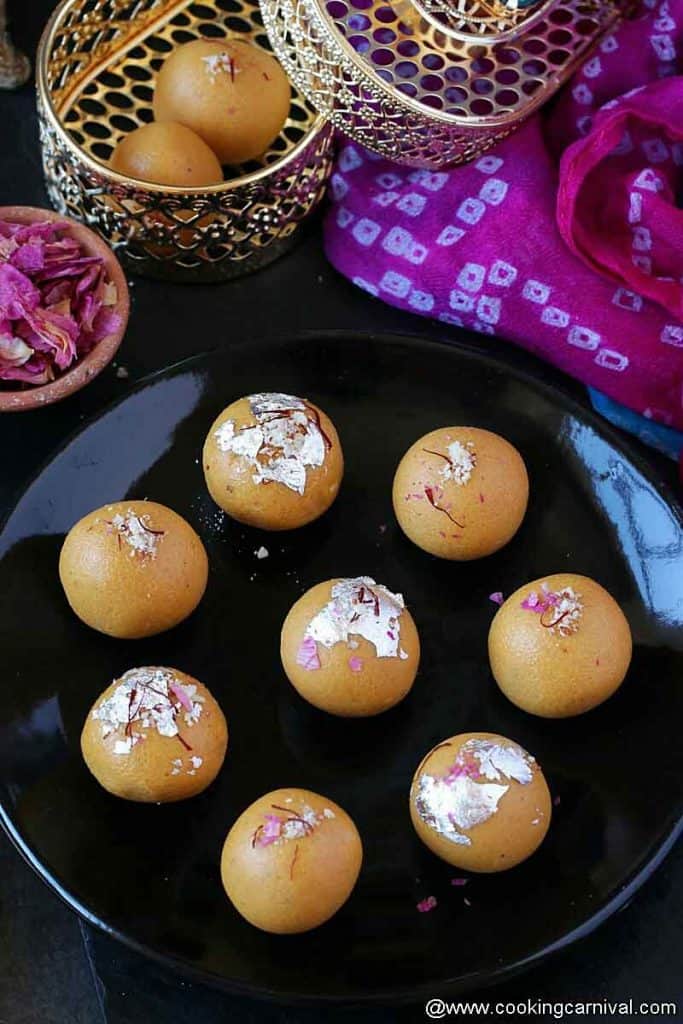 Indian sweet besan laddu in a black plate