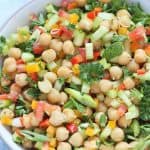 Balela Salad (Bah-lay-la salad) is Middle Eastern-style Chickpea salad. This hearty refreshing salad is bursting with zesty flavor. So easy, so delicious, nutrient dense and satisfying meal! It is perfect for any party or busy weeknight meal.