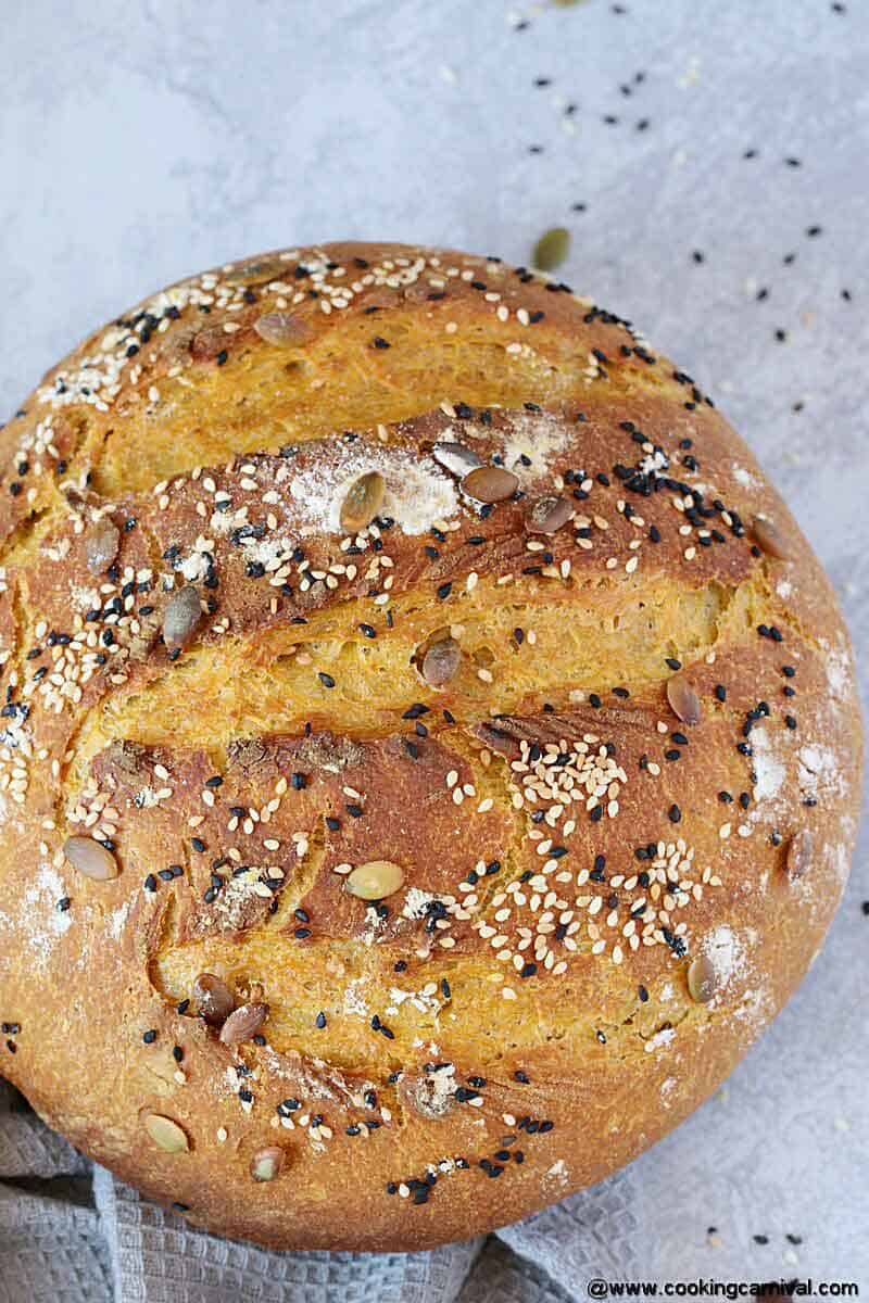 Loaf of no knead bread on a gray board (Proofed dough in instant pot)