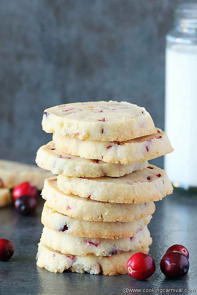 stack of shortbread cookies on a black tile