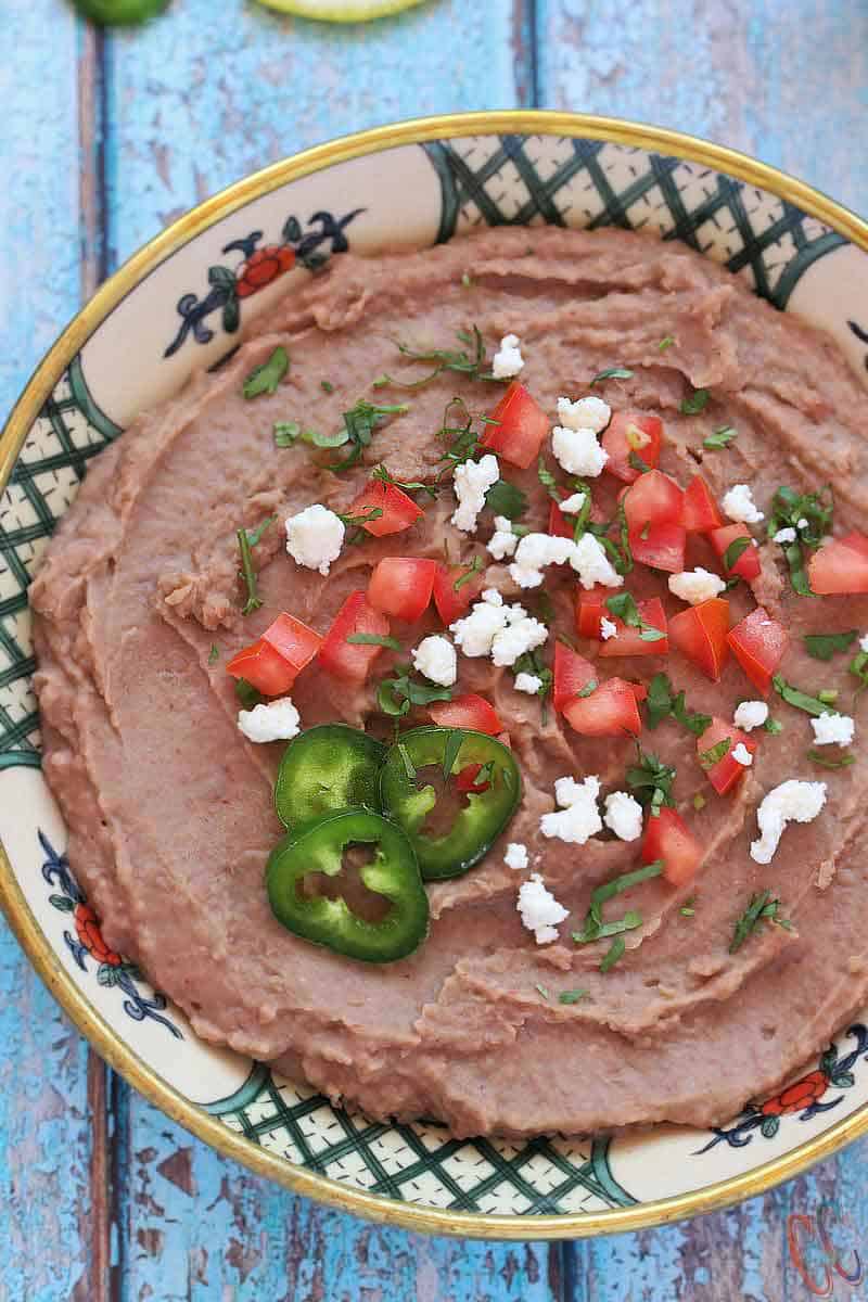 Instant Pot Refried Beans - Vegan, naturally gluten-free, Creamy, flavorful and effortless way of making refried beans at home in Instant pot/pressure cooker.