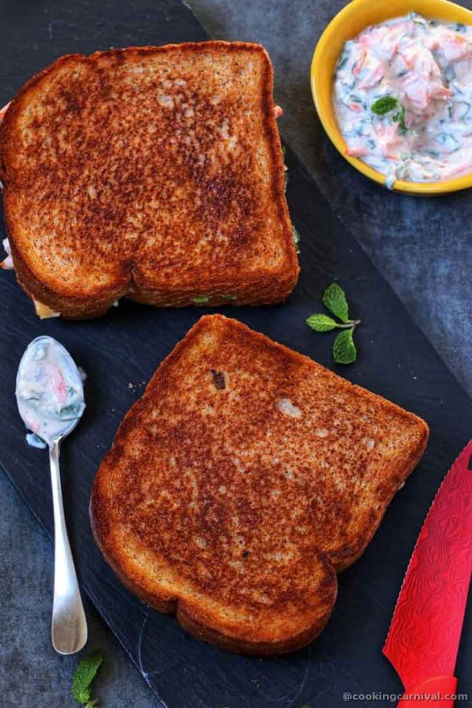 toasted sandwich on a wooden board