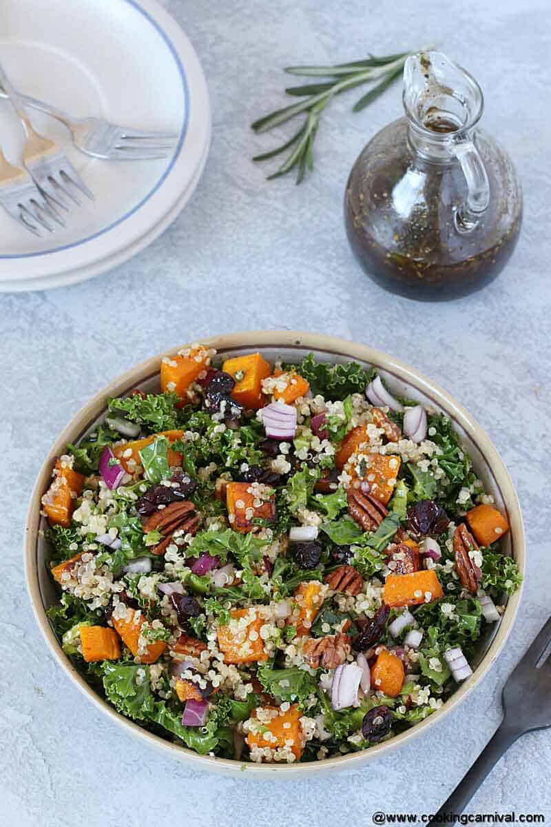 easy Roasted Butternut Squash Salad bowl on a gray board