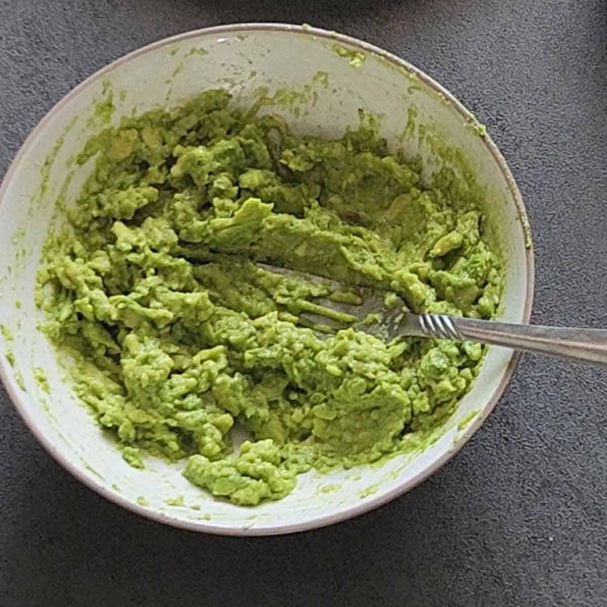 mashed avocado in a bowl.