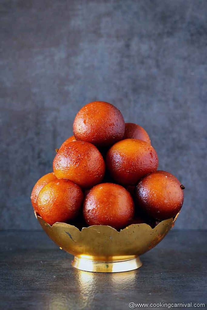 Gulab jamun in traditional bowl