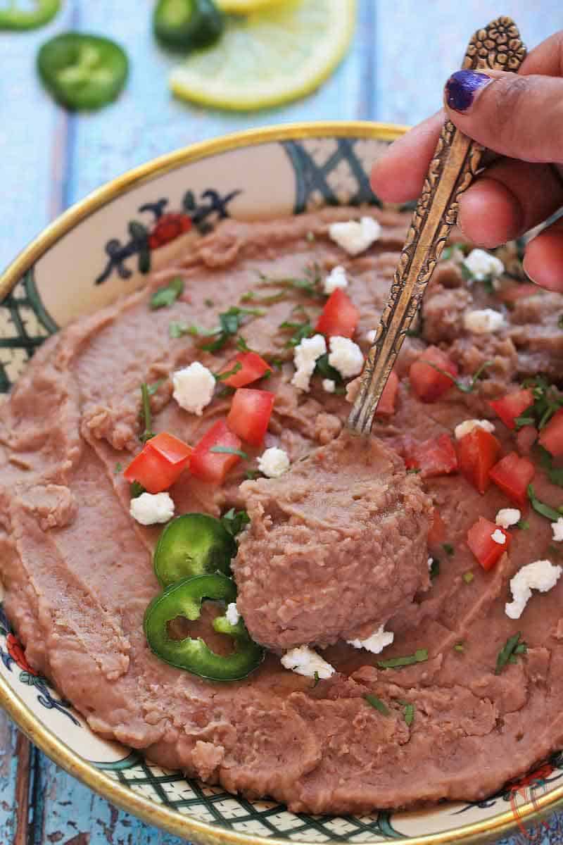 Instant Pot Refried Beans - Vegan, naturally gluten-free, Creamy, flavorful and effortless way of making refried beans at home in Instant pot/pressure cooker.