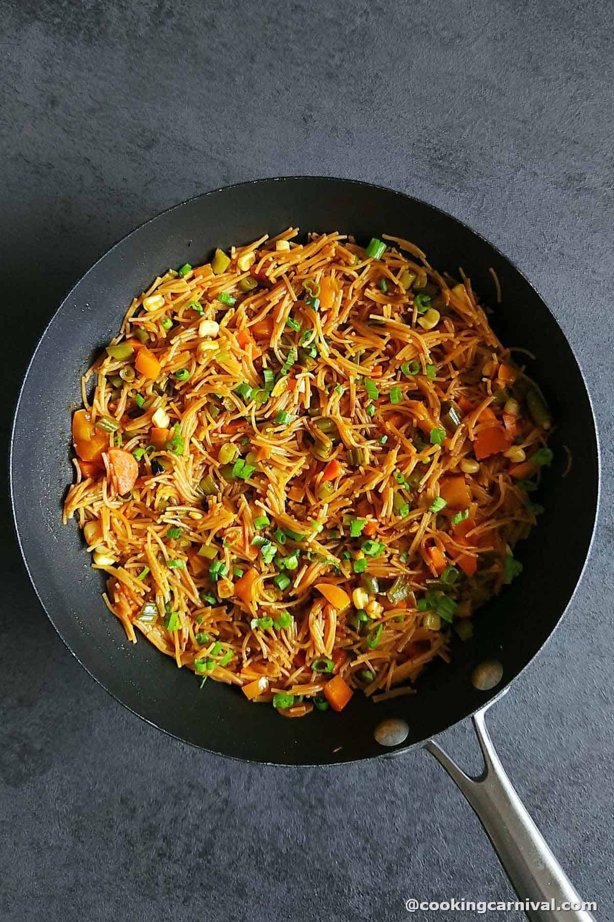 Indo-Chinese Vermicelli in a wok pan