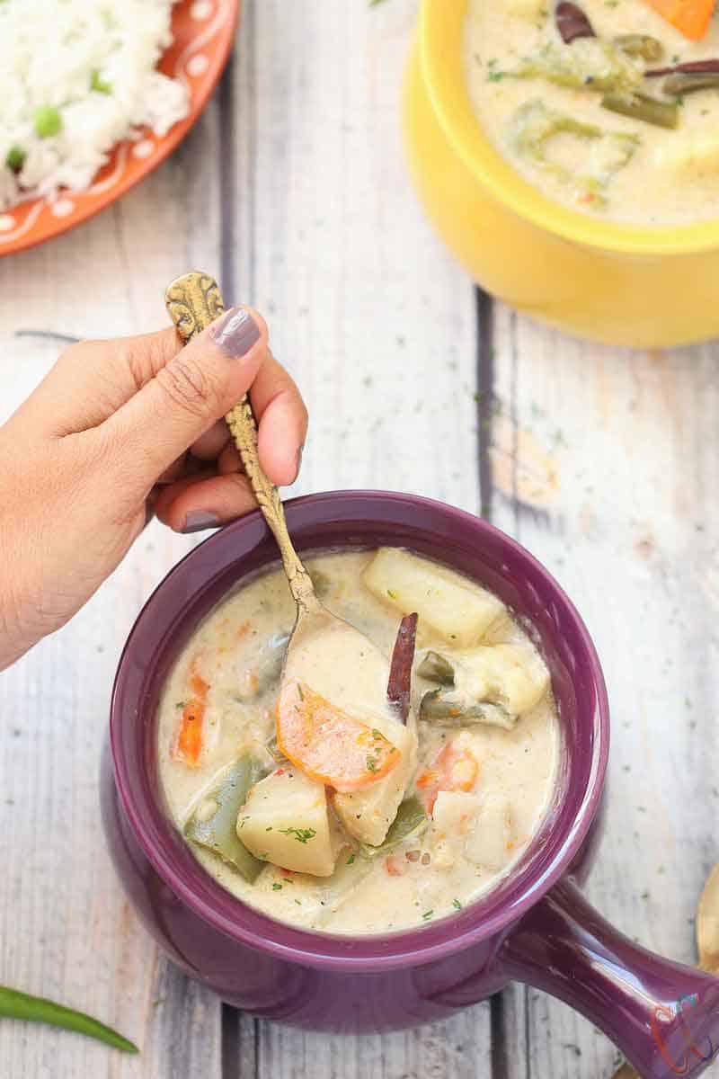 Instant Pot Kerala Vegetable Stew - A complete Comfort and Satisfying food that can be made in a fraction of the time. Veg Stew is Vegetarian / Vegan Instant Pot Recipe with lots of vegetables in a coconut milk based hearty sauce that will change your life.