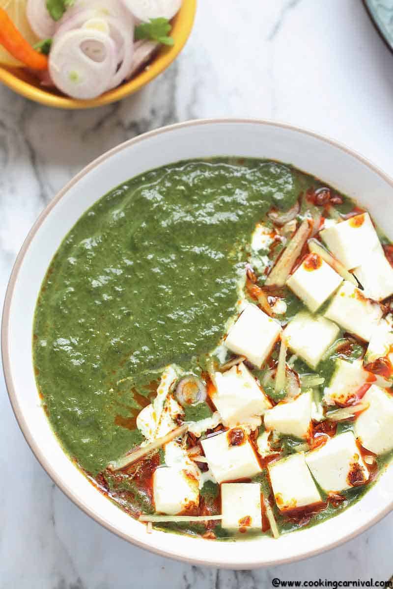 Instant Pot Palak Paneer - Indian Cottage Cheese in Smooth, luscious, Delicious, Creamy Spinach Gravy. Palak Paneer is one of the most loved North Indian Dishes across the world. It is Eaten with Roti, Paratha, Naan, Parotta or Rice. This Vegetarian Indian Instant Pot Recipe is a healthy weeknight dinner recipe that's naturally gluten free, paleo and can easily be made Vegan by using tofu instead of Paneer and Oil instant of Ghee/clarified butter.