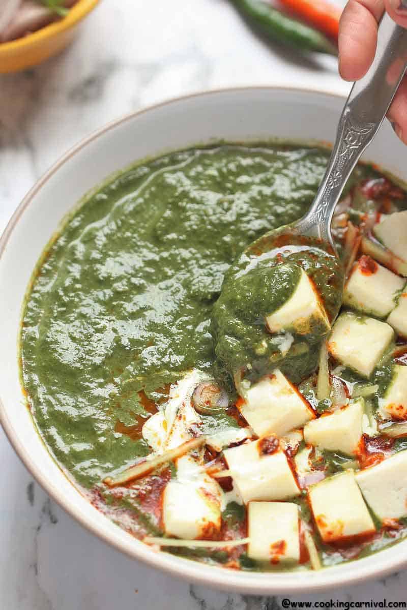 Instant Pot Palak Paneer - Indian Cottage Cheese in Smooth, luscious, Delicious, Creamy Spinach Gravy. Palak Paneer is one of the most loved North Indian Dishes across the world. It is Eaten with Roti, Paratha, Naan, Parotta or Rice. This Vegetarian Indian Instant Pot Recipe is a healthy weeknight dinner recipe that's naturally gluten free, paleo and can easily be made Vegan by using tofu instead of Paneer and Oil instant of Ghee/clarified butter.