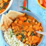 Sweet potato curry made in instant pot and served in bowl with rice and Naan