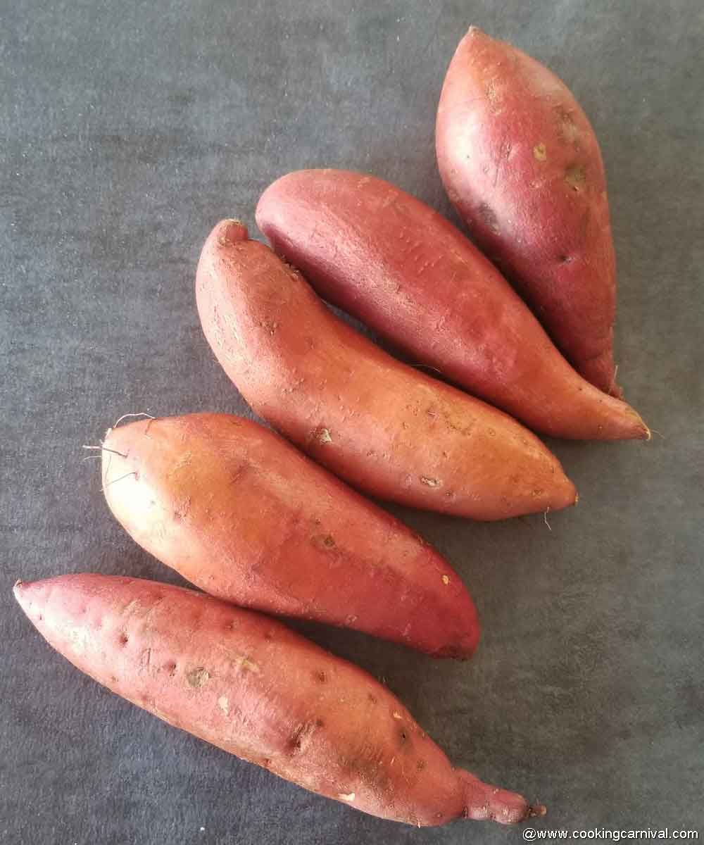 Sweet potatoes on a black tile