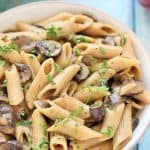 This Instant Pot Vegan Mushroom Stroganoff Recipe is quick, easy, comforting, hearty, savory, creamy, delicious, nut-free and perfect for weeknight Dinner.