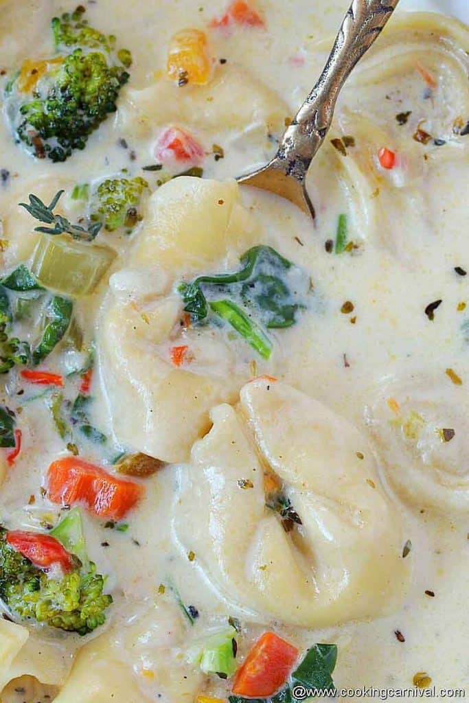 Close up shot of instant pot vegetable tortellini soup