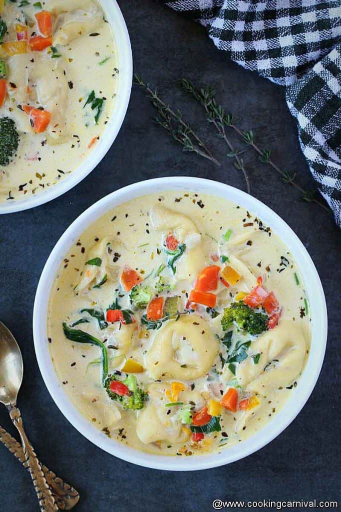 tortellini soup made in instant pot in a white bowl