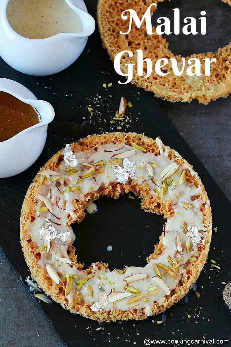 Ghevar on cheese board, sugar syrup and rabdi on the sides