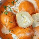 Close up shot of malai kofta in steel bowl