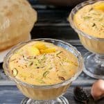 Mango Shrikhand | Aamrkhand - Lush Mango flavored Popular Indian Dessert made with Greek or Thick yogurt, Mango, sweetener, Cardamom, some pistachios and aromatic Saffron.