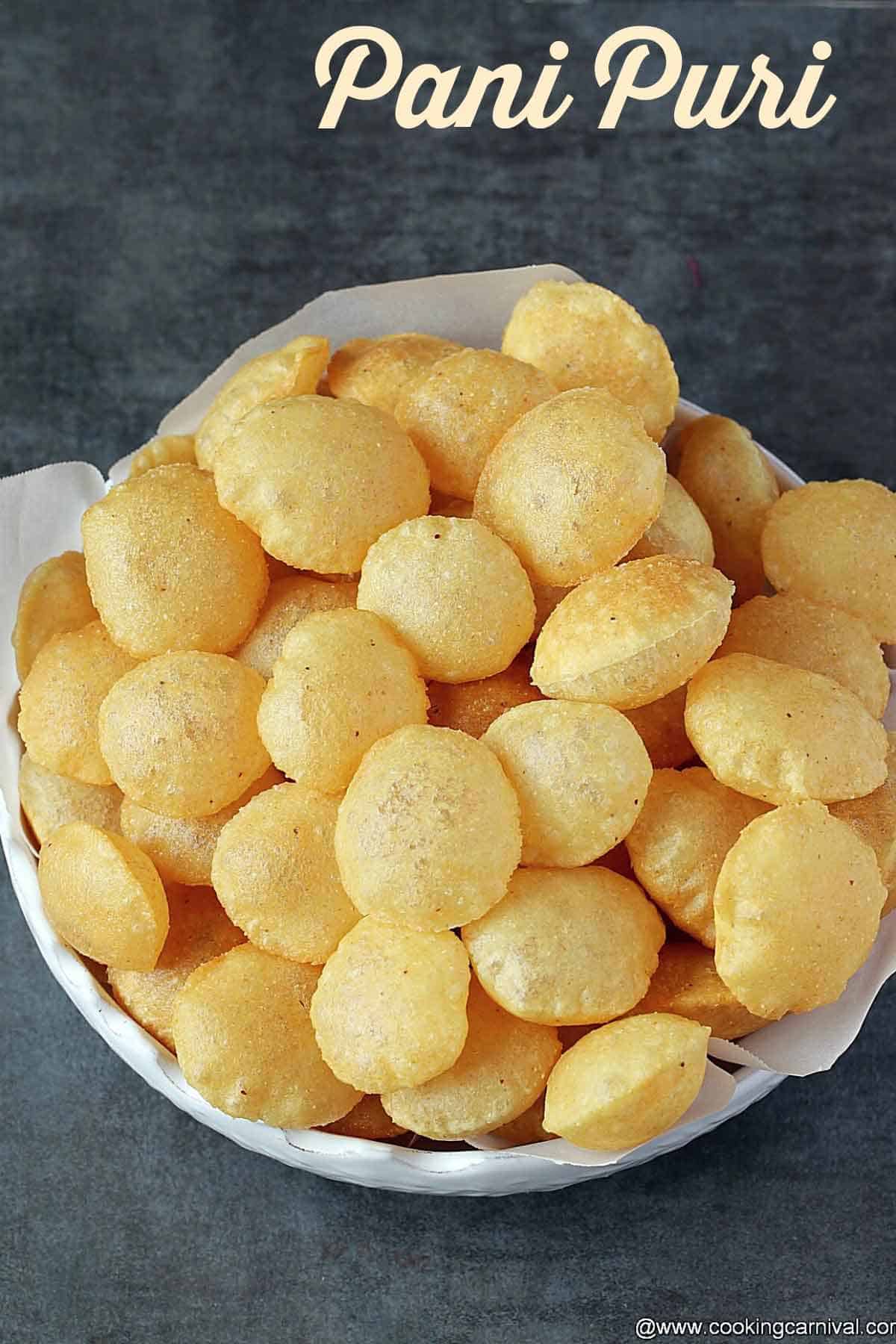 Puri for pani puri chaat in white bowl