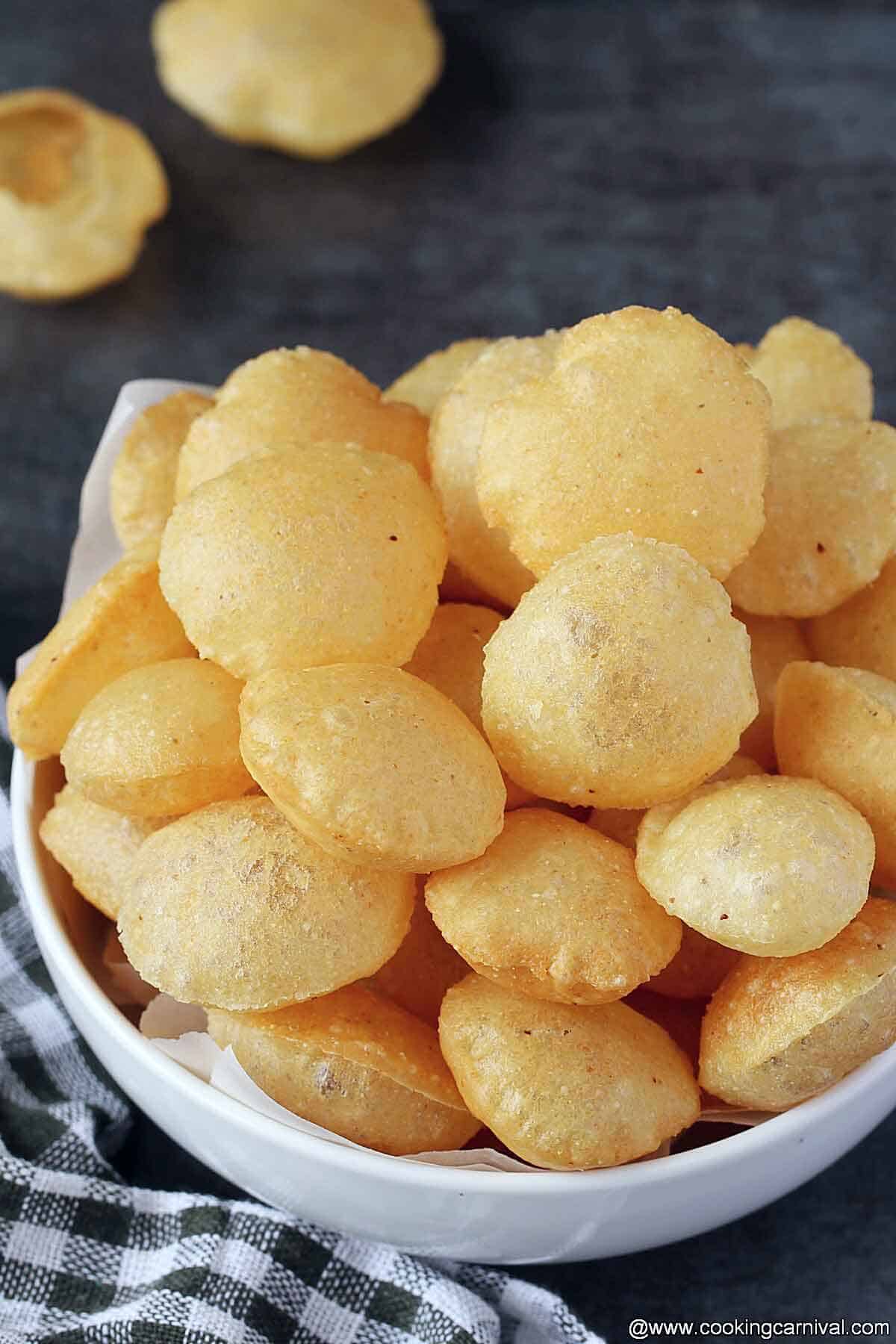 Puri in white bowl