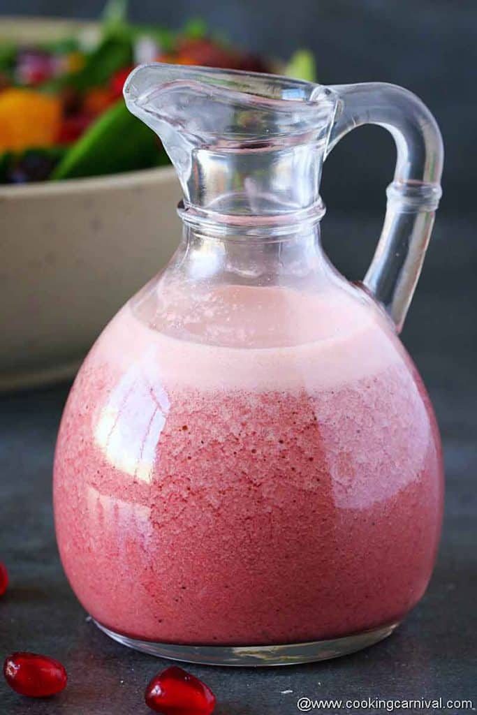 pomegranate vinaigrette in a dressing bottle