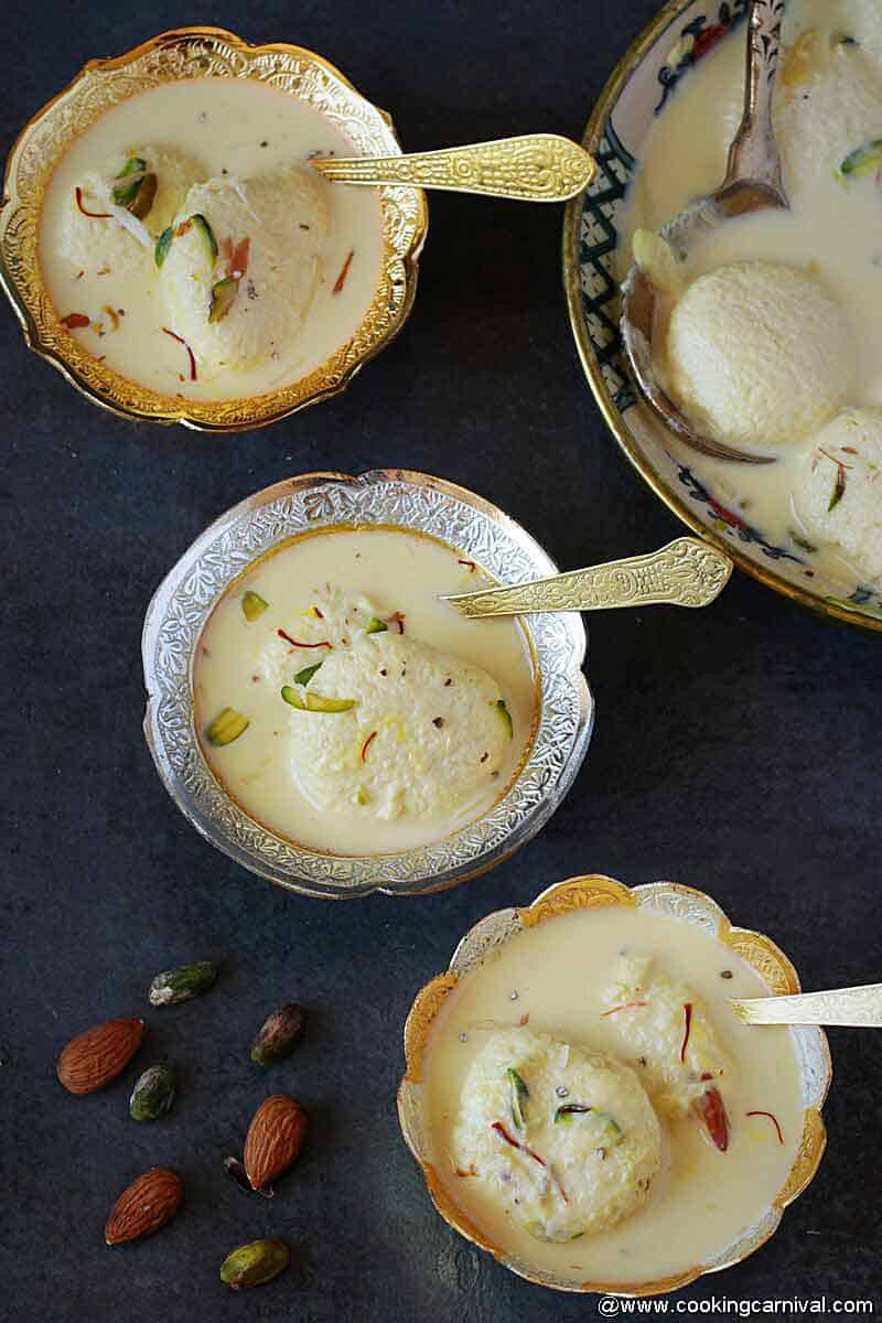 Ras malai in small 3 traditional bowl with spoons