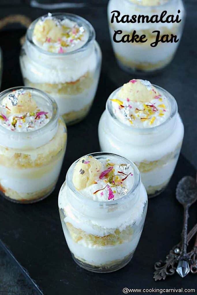 Rasmalai cake in small jar on black tile