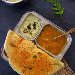 rava dosa, coconut chutney and sambar on a plate