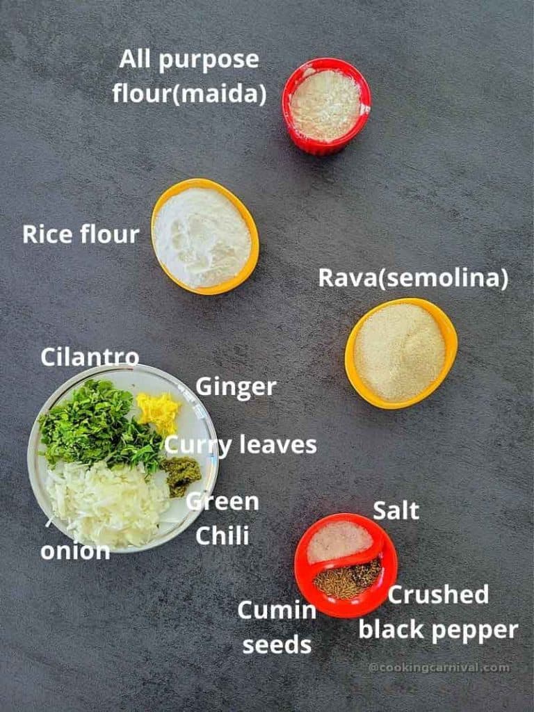 Premeasured ingredients of suji ka dosa on a black tile