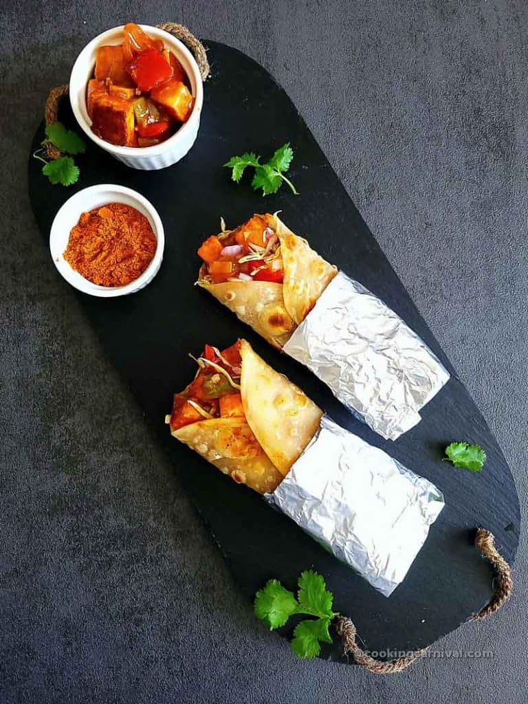 2 Schezwan paneer frankie on cheese board