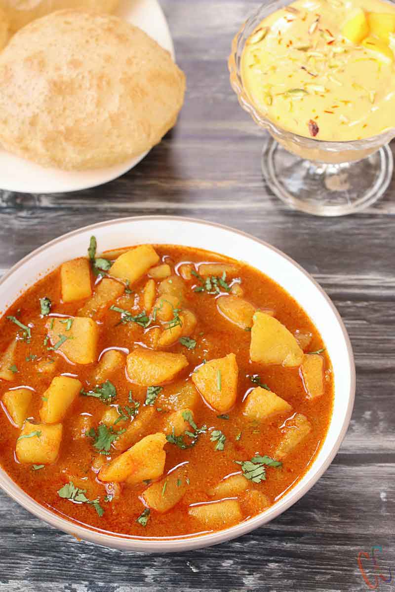 Bateta Nu Rasavalu Shak | Simple Vegan Potato curry is very common sabzi in every Gujarati thali. It is traditional Gujarati Side dish.