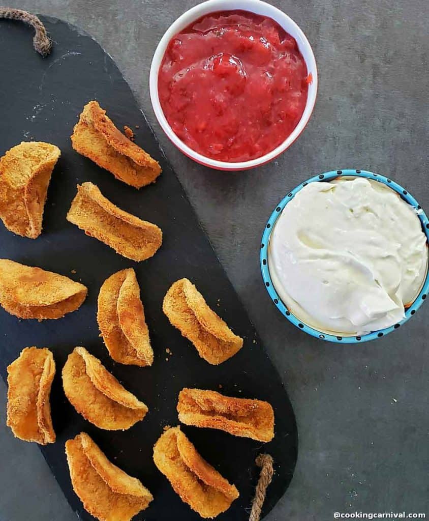 cheesecake, taco shells and strawberry sauce