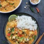 Tofu thai curry in a bowl served with jasmine rice