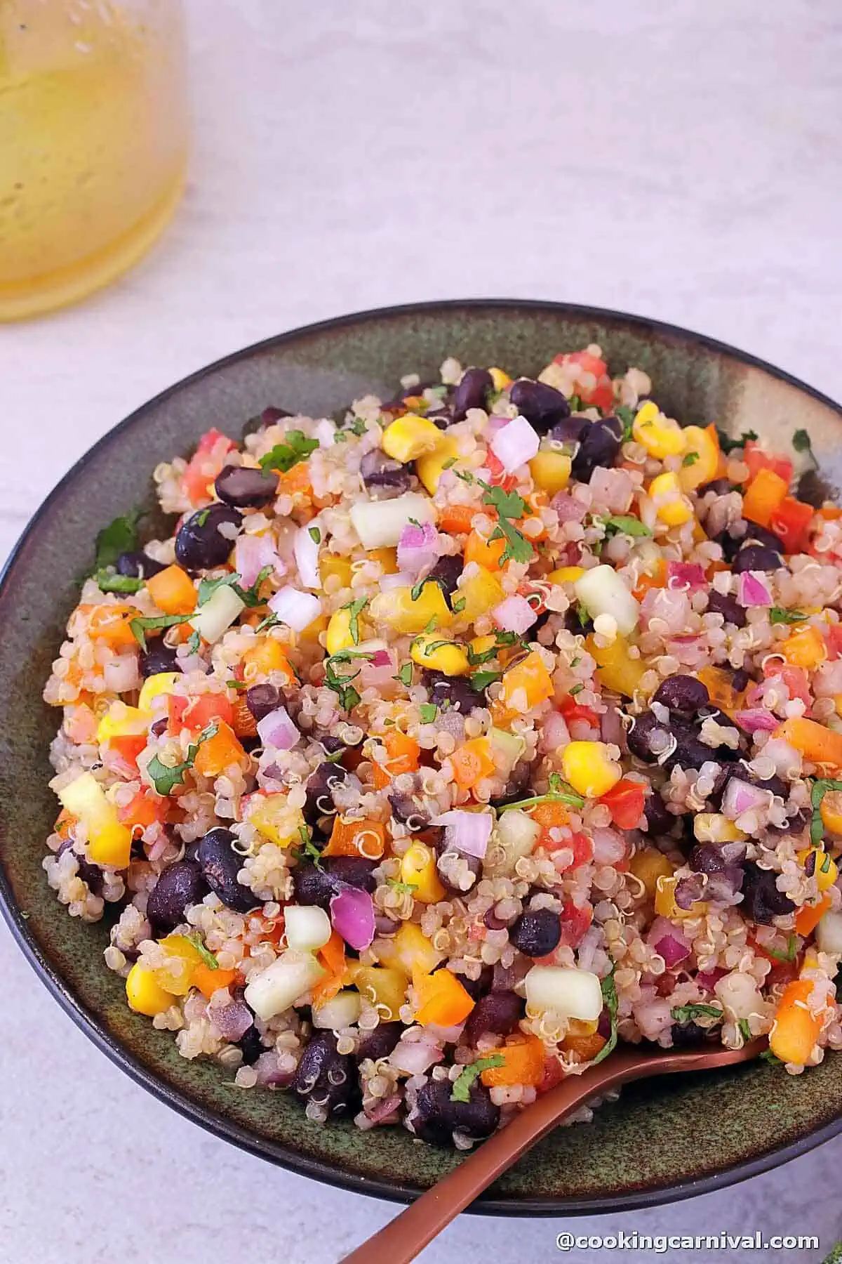 Black Bean Quinoa Salad in a bowl with a fork