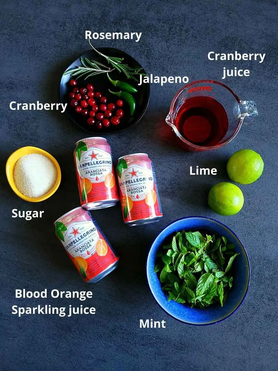 Pre-measured ingredients for Blood orange cranberry jalapeno mojito