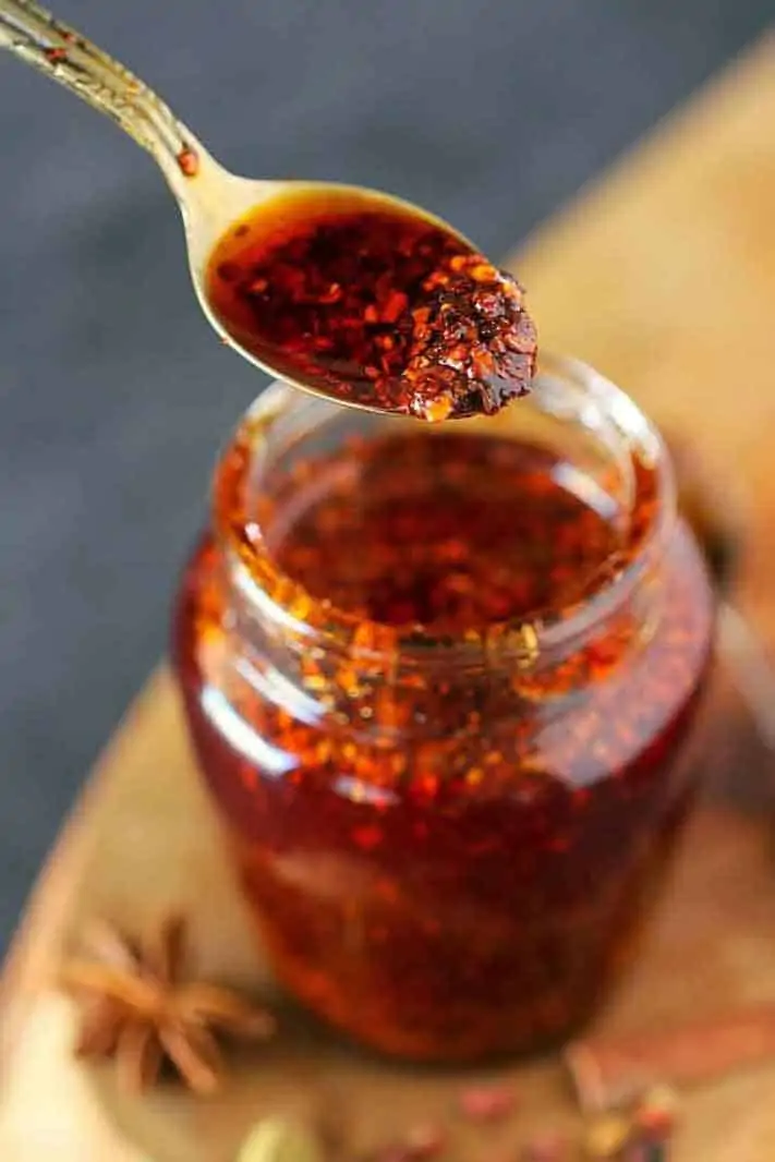 taking chili garlic oil from the bottle