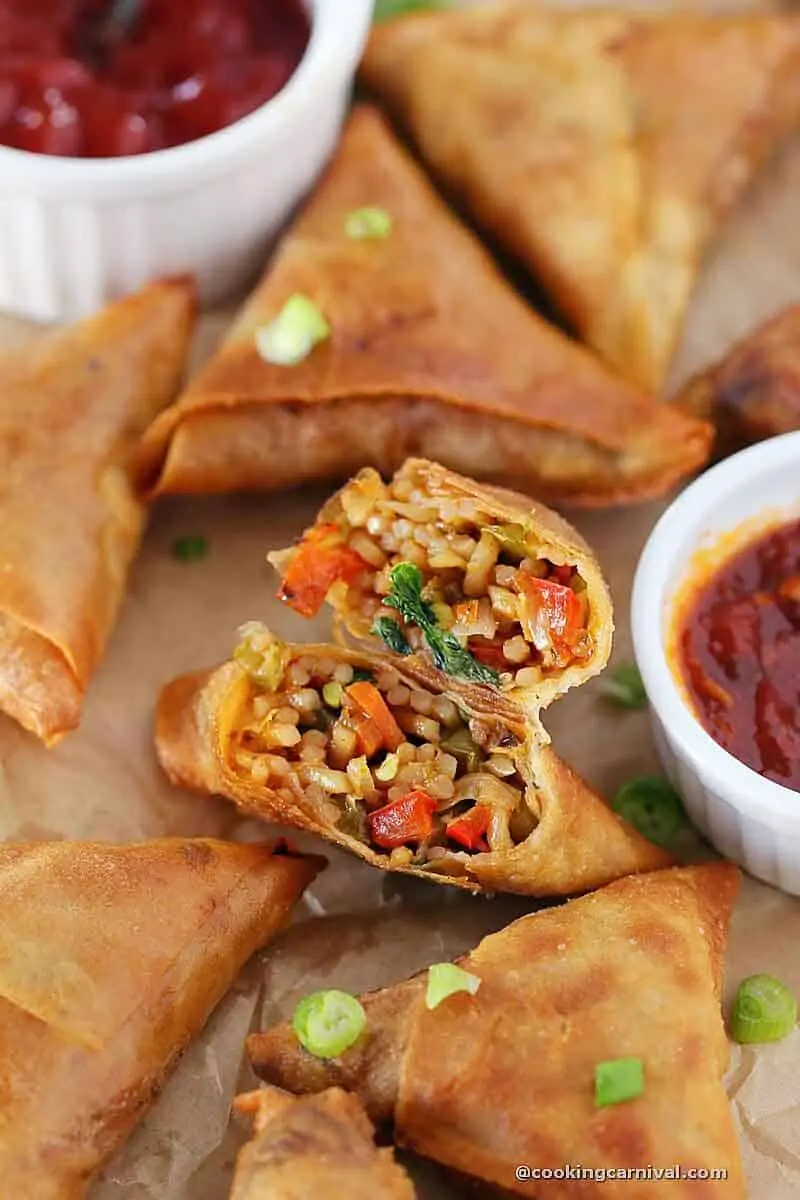 Showing stuffing of chinese samosa