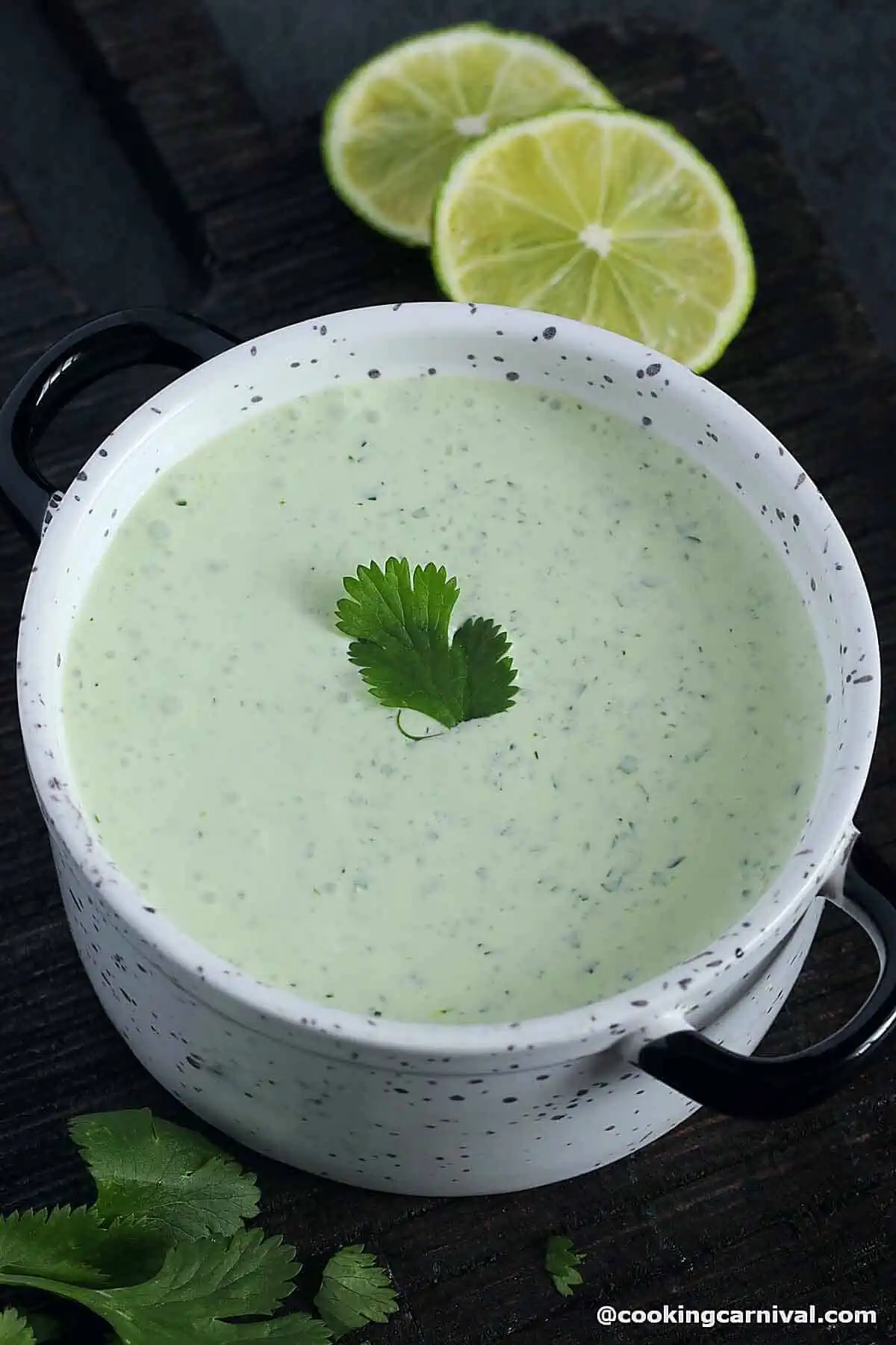 Cilantro lime crema in a white bowl.