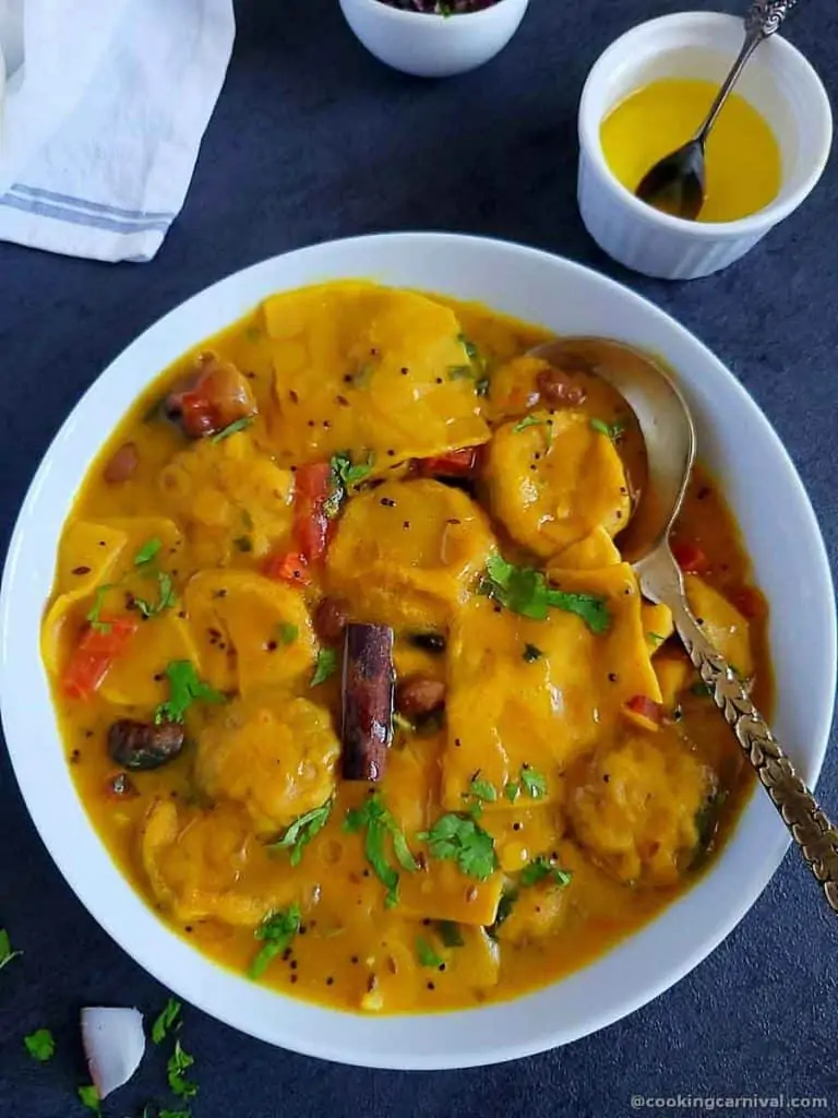 Dal dhokli in white bowl