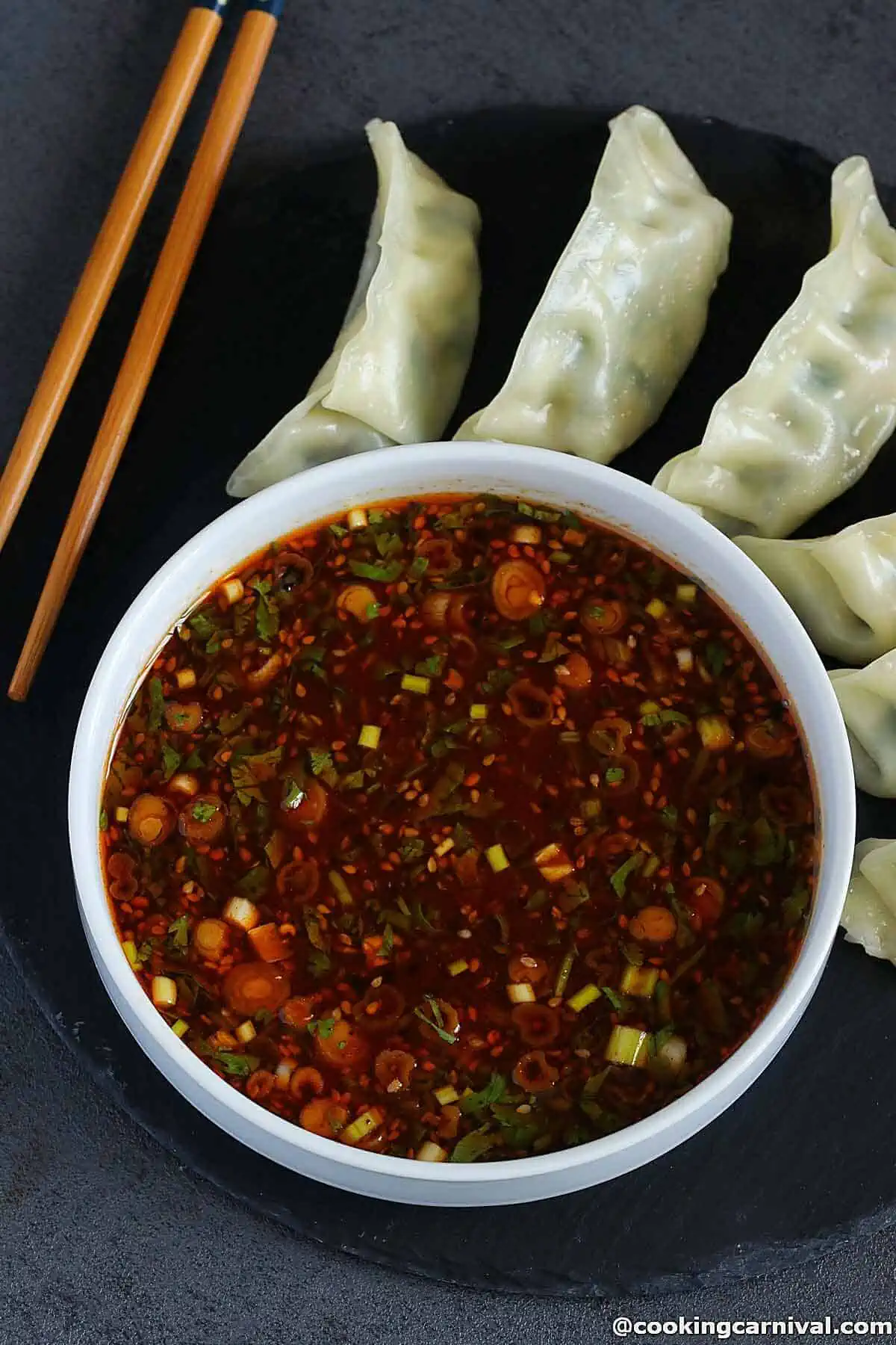 dumpling sauce in white bowl, served with gyoza.