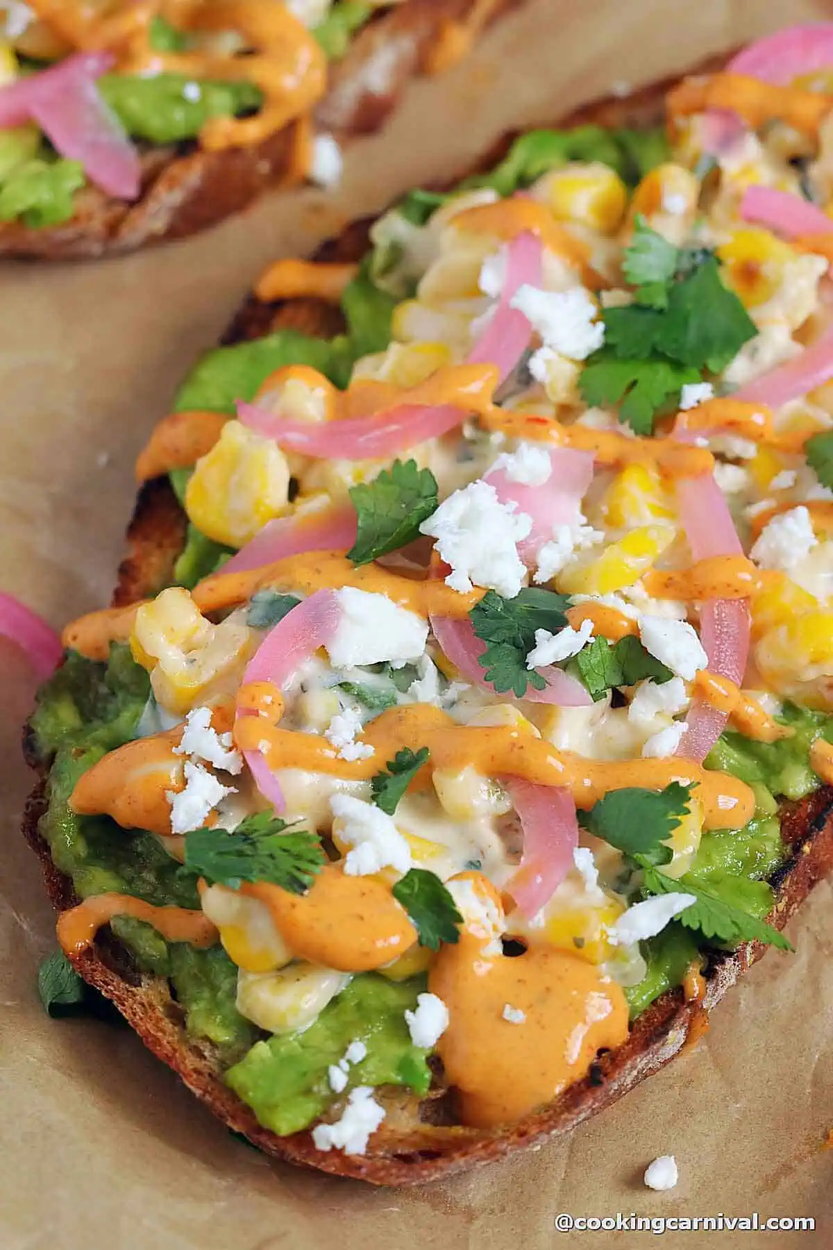 showing the texture of avocado toast with Mexican street corn.