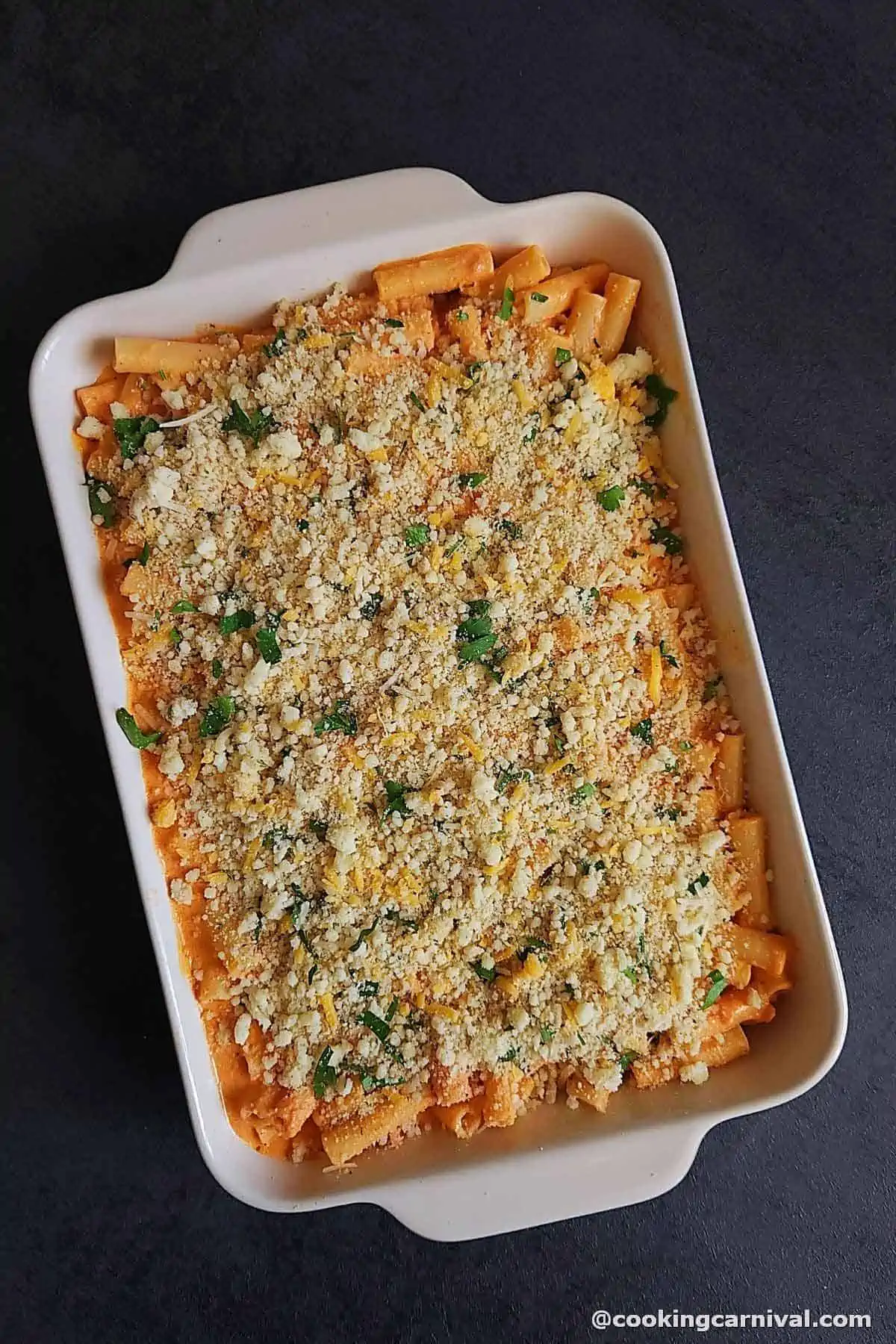 Five Cheese Ziti al Forno in a baking tray, ready to be baked in the oven.