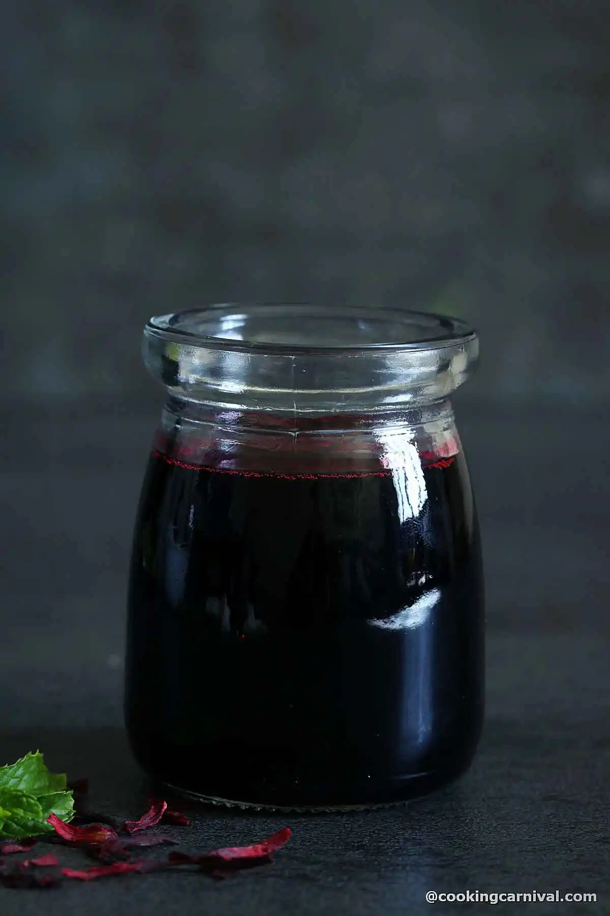 Hibiscus simple syrup in jar.