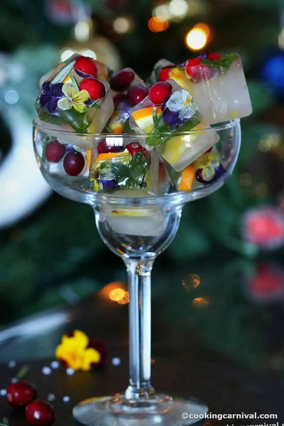 Cranberry, orange and rosemary infused ice cubes.