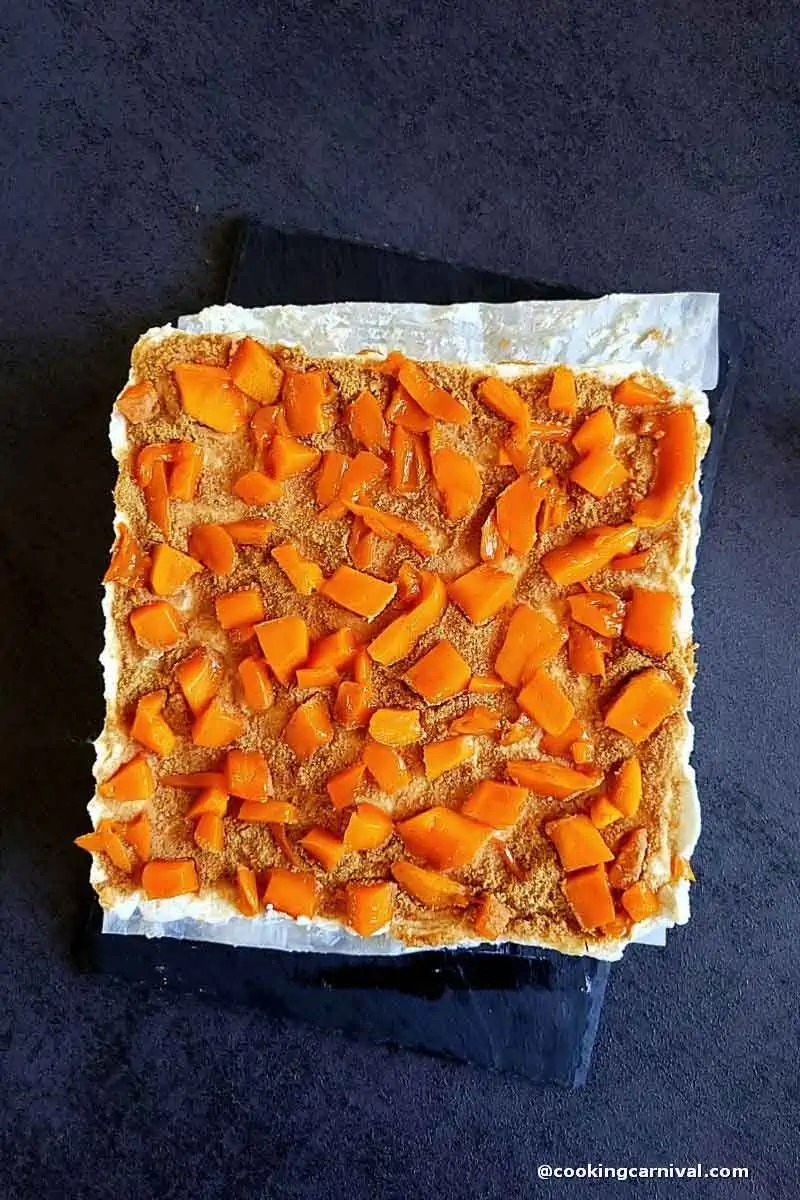 mango float on a black cheese board