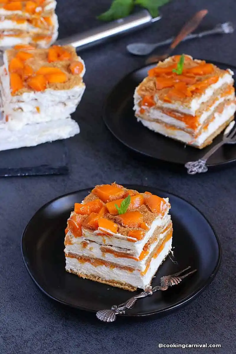 Mango float, mango graham cake served in black plate